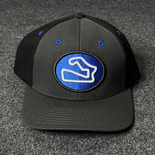Capelli Sport “Track Logo” Flat Cap – Black & Royal Blue