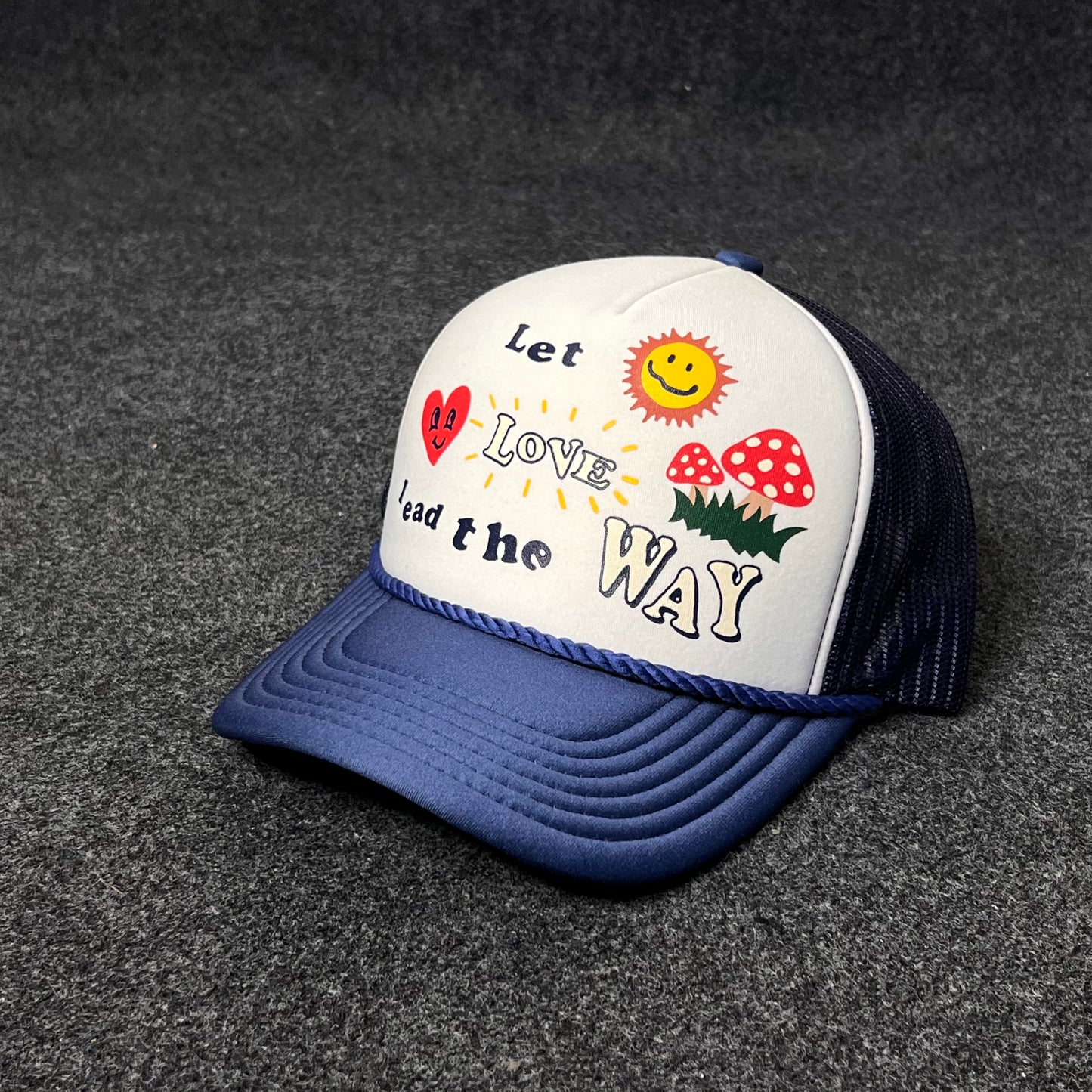A Trucker Hat with a "Let Love Lead the Way" graphic.