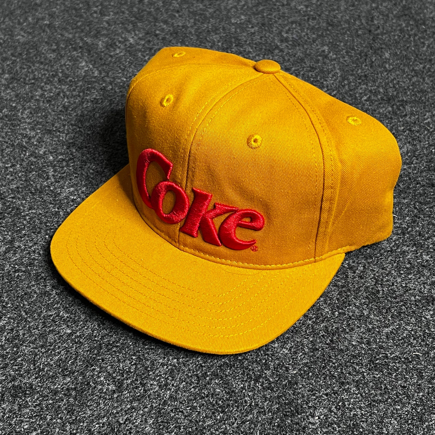 Coke snapback hat.