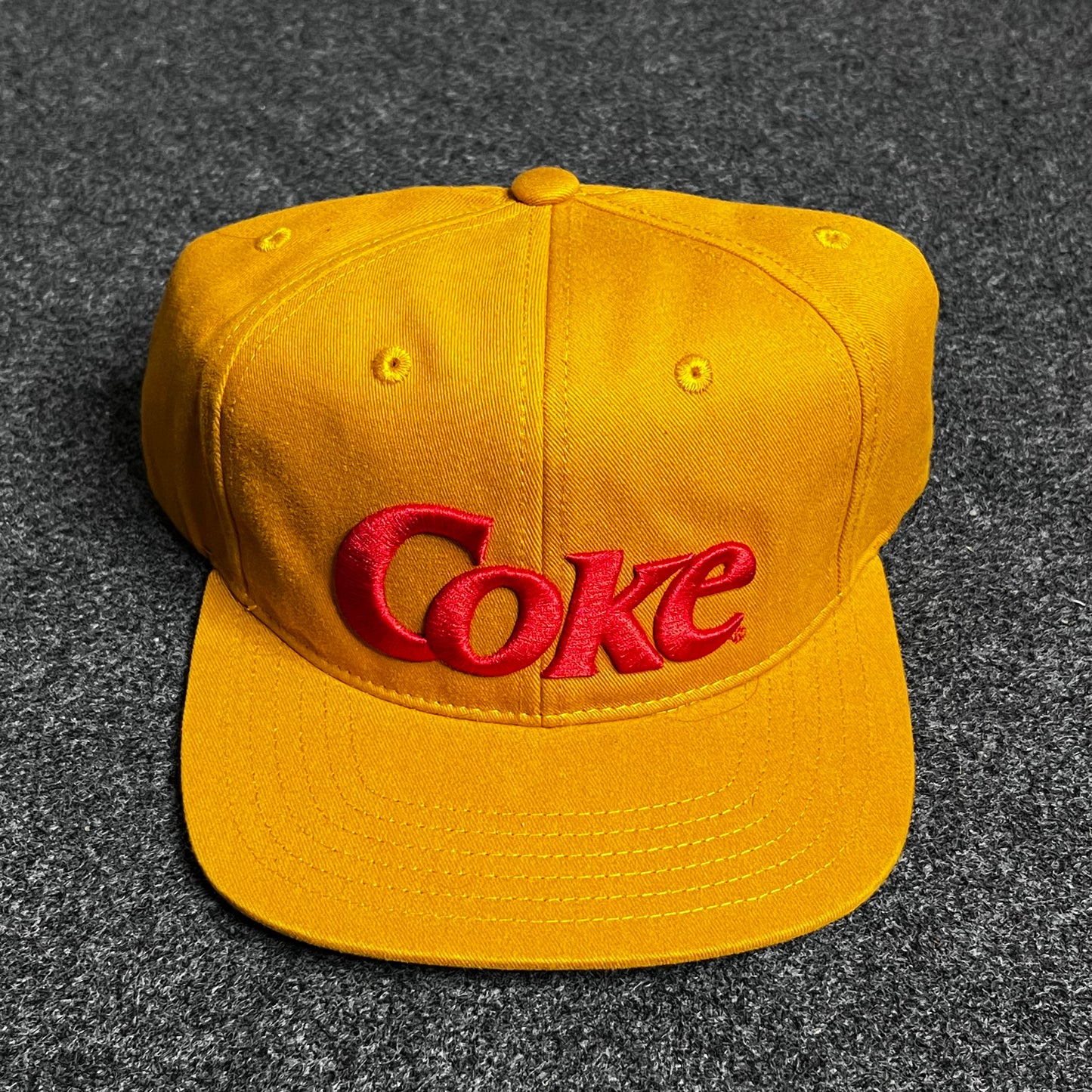 Coke snapback hat.