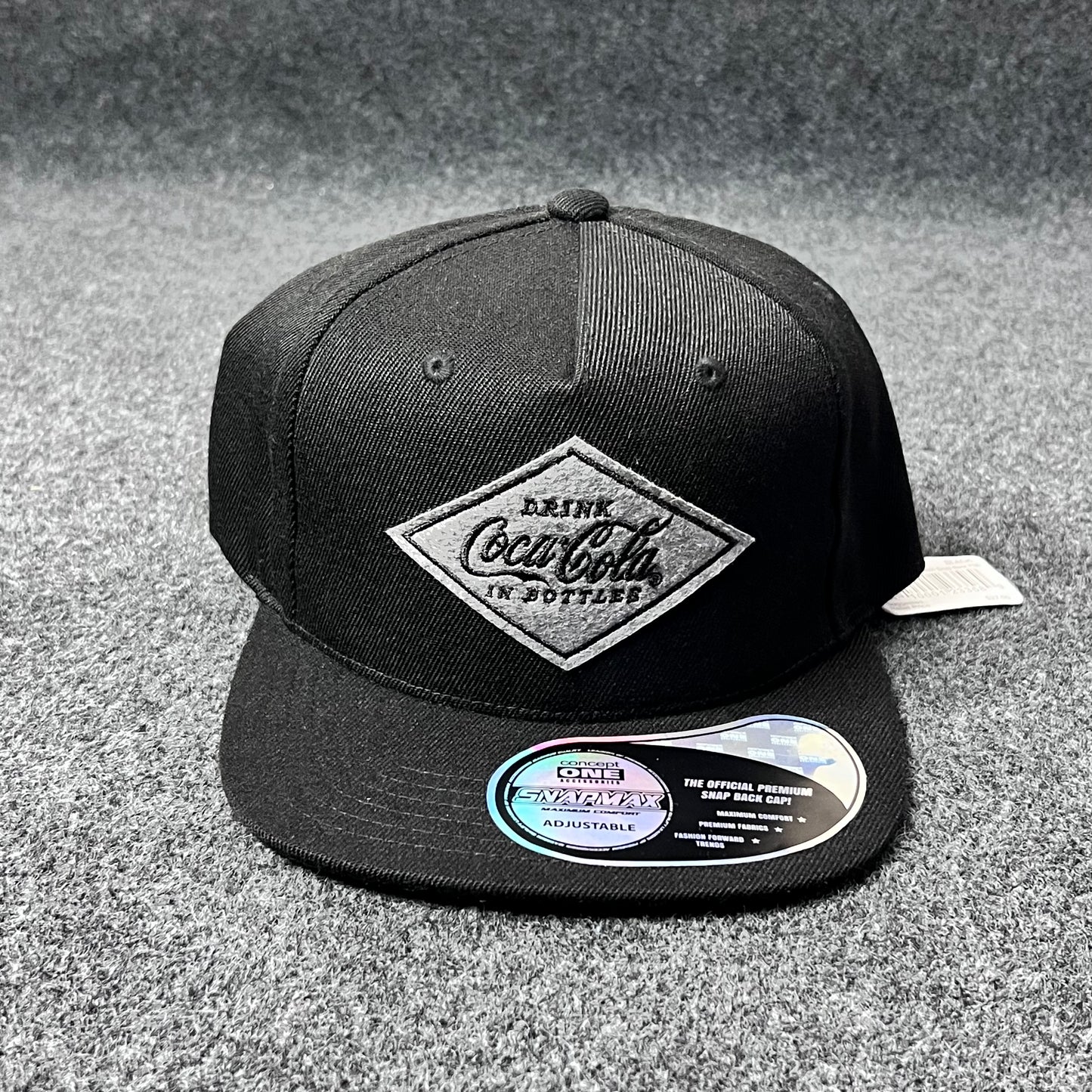 Black Coca-Cola branded Snapback Hat.