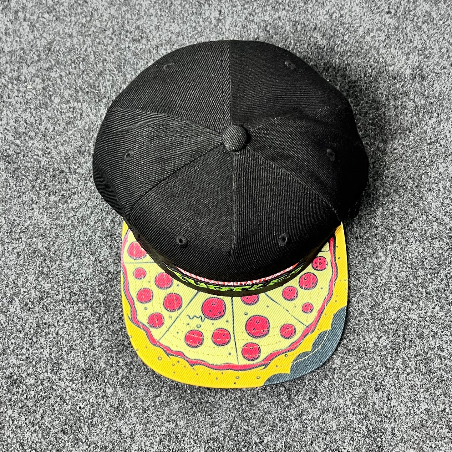 Teenage Mutant Ninja Turtles Pizza Snapback Hat.