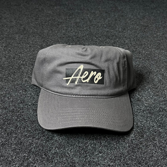 Aero Script Logo Cap – Minimalist Streetwear Style