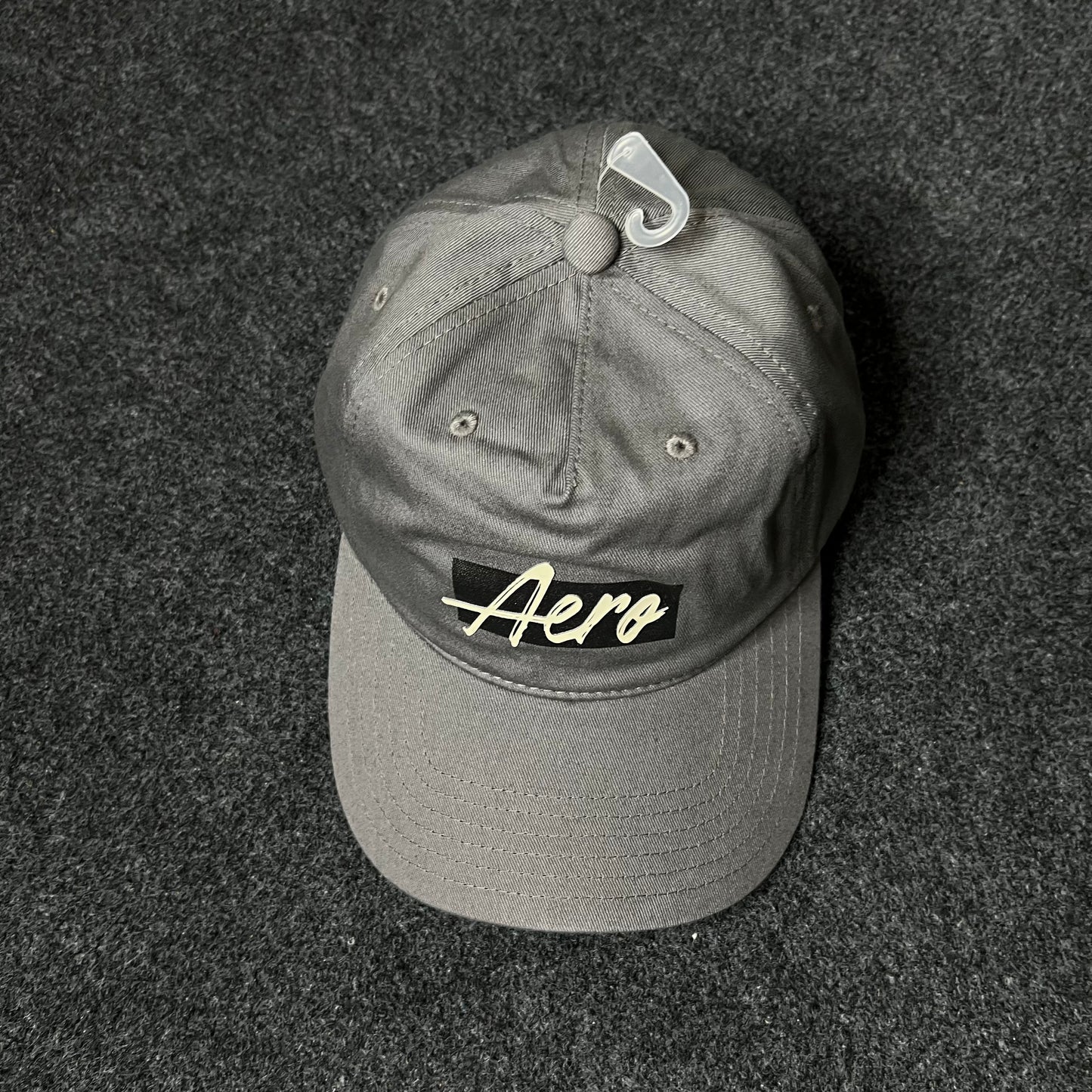 Aero Script Grey Cap