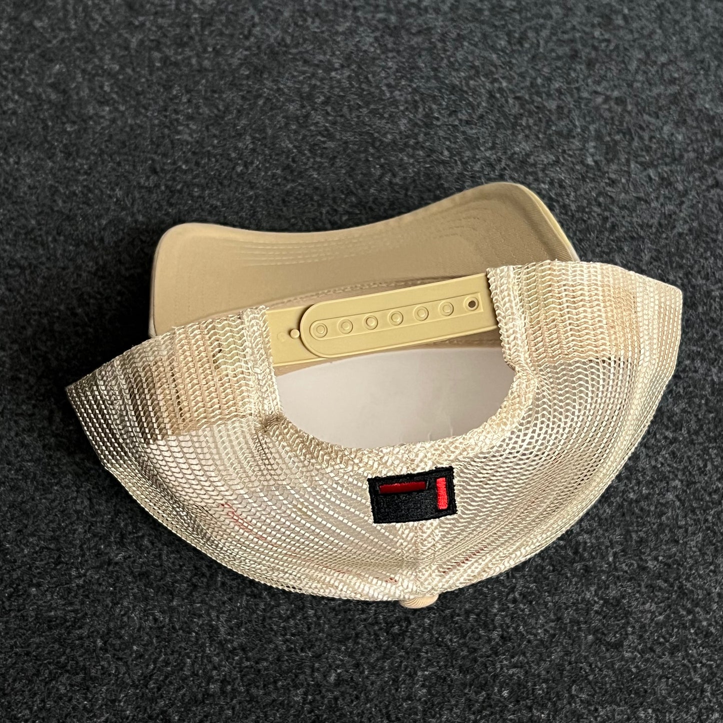 Beige Camo Mesh Trucker Cap โ Orange Embroidered Logo