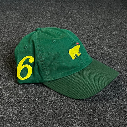 Unstructured Dad Cap – Forest Green with Yellow Bear (Red Accent)