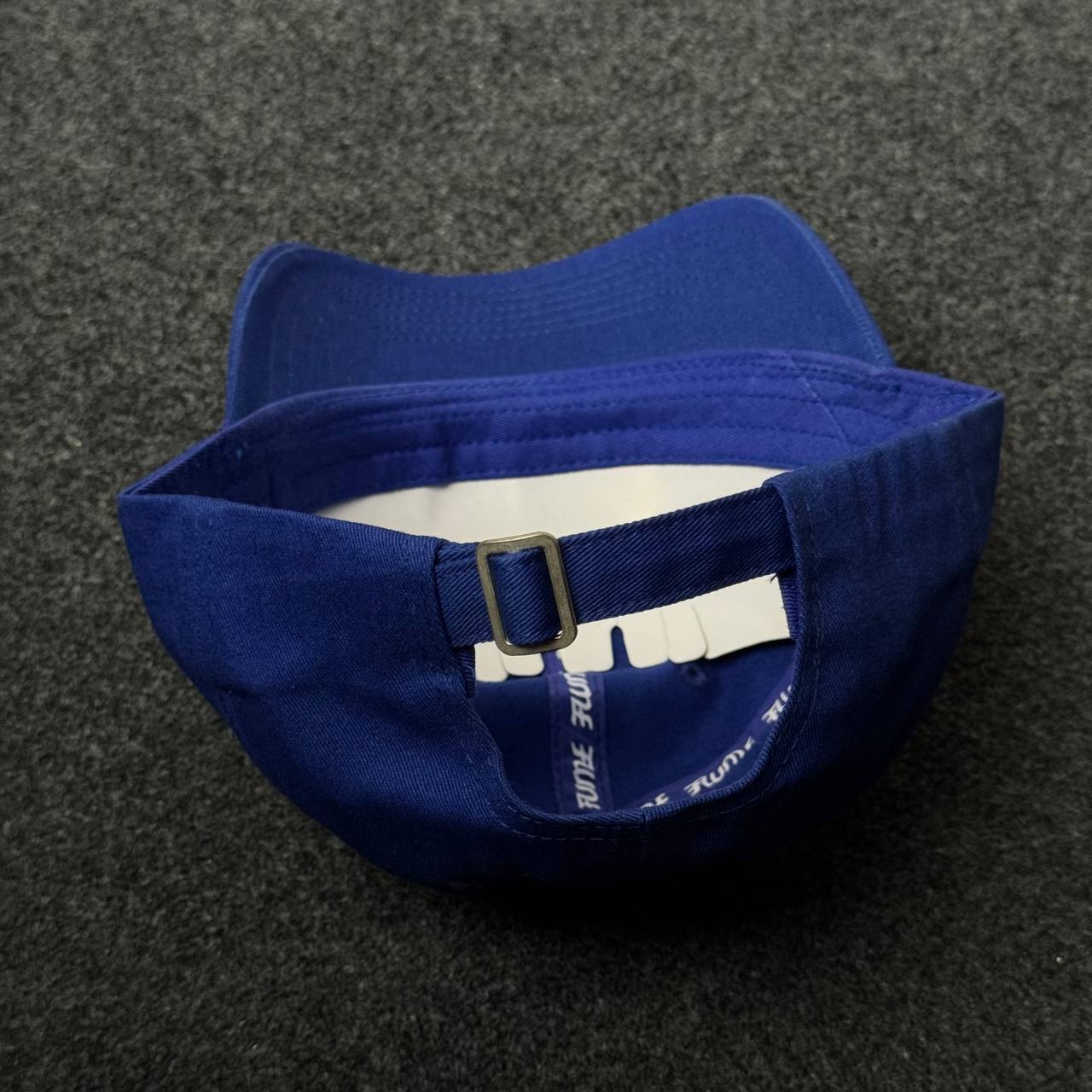 Blue Cap with A Geometric Patch Featuring The Number 2