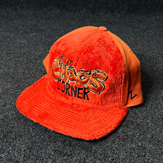 Capelli Sport “Chaos Corner” Fuzzy Flat Cap – Bright Orange