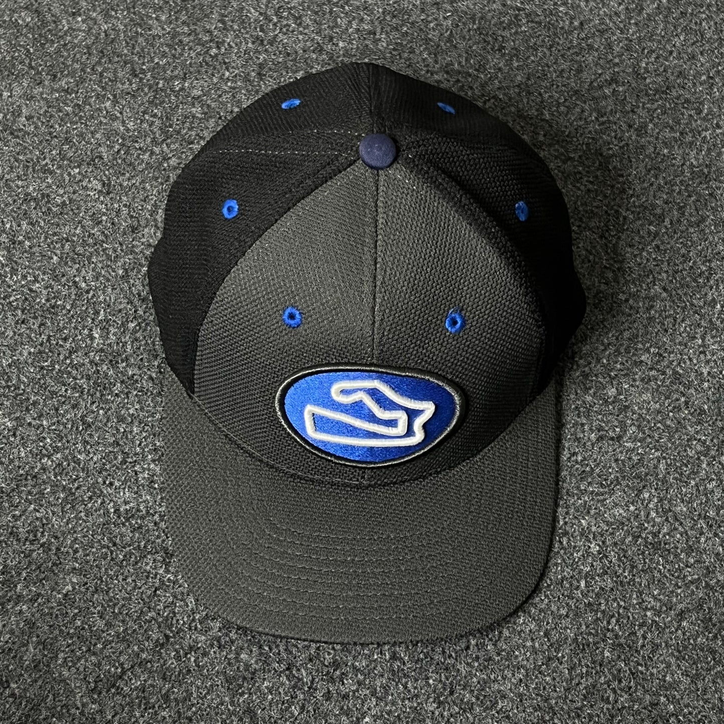 Capelli Sport “Track Logo” Flat Cap – Black & Royal Blue