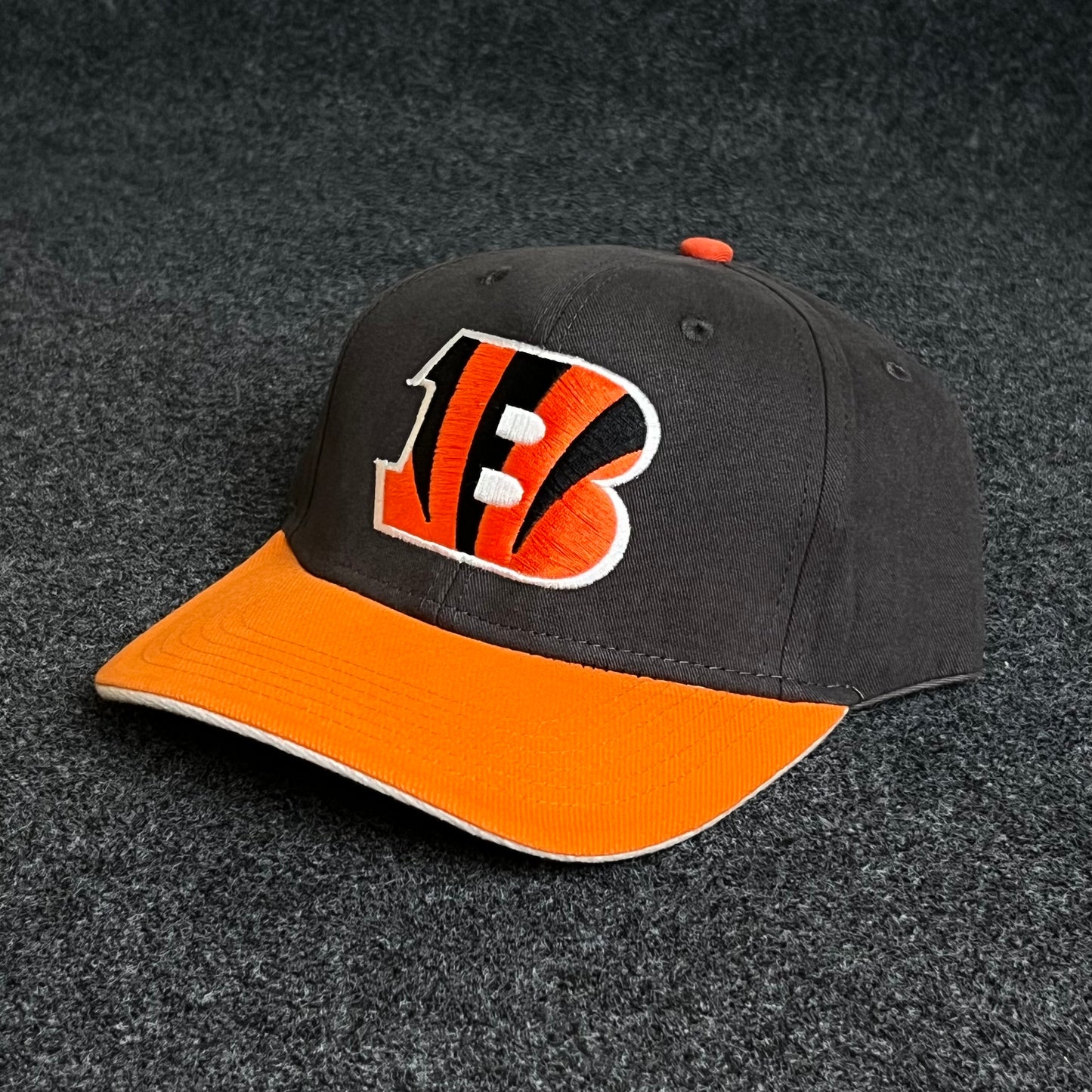 Classic Bengals pride in a two-tone ball cap