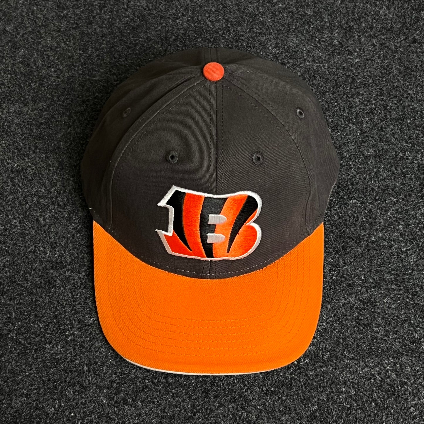 Classic Bengals pride in a two-tone ball cap