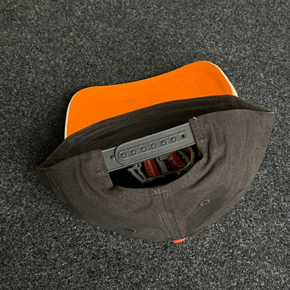 Classic Bengals pride in a two-tone ball cap