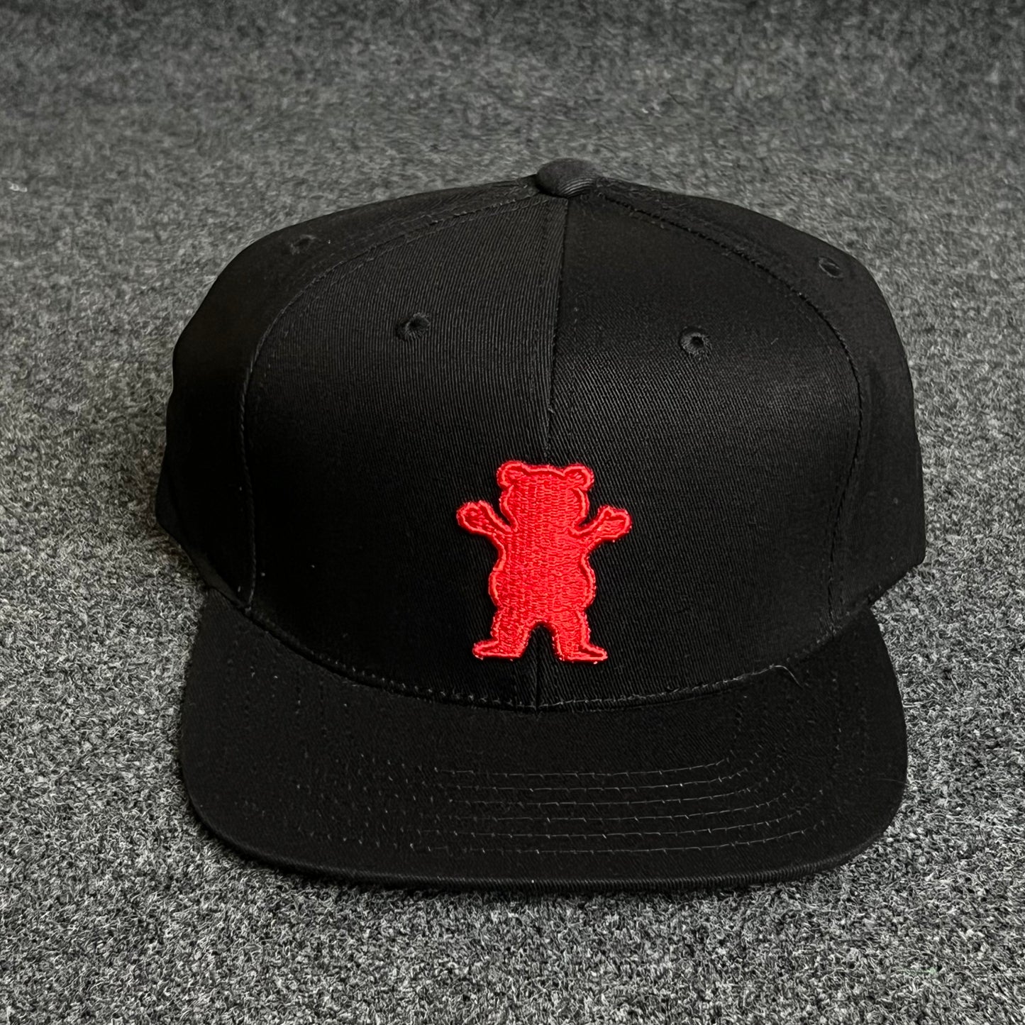 Clean modern style with a standout mascot touch Cap