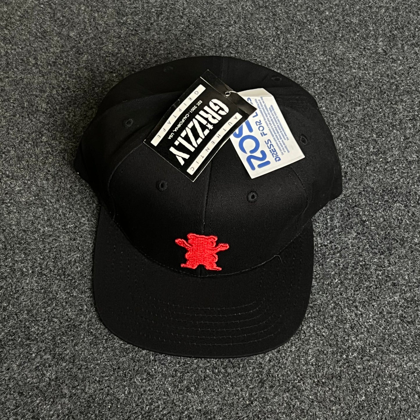 Clean modern style with a standout mascot touch Cap
