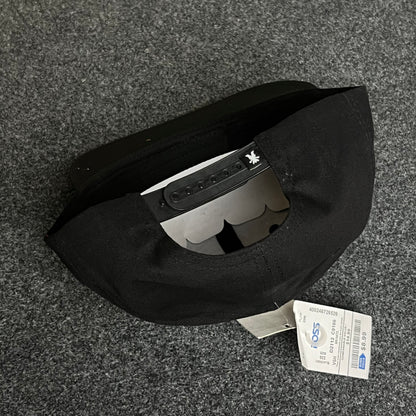 Clean modern style with a standout mascot touch Cap