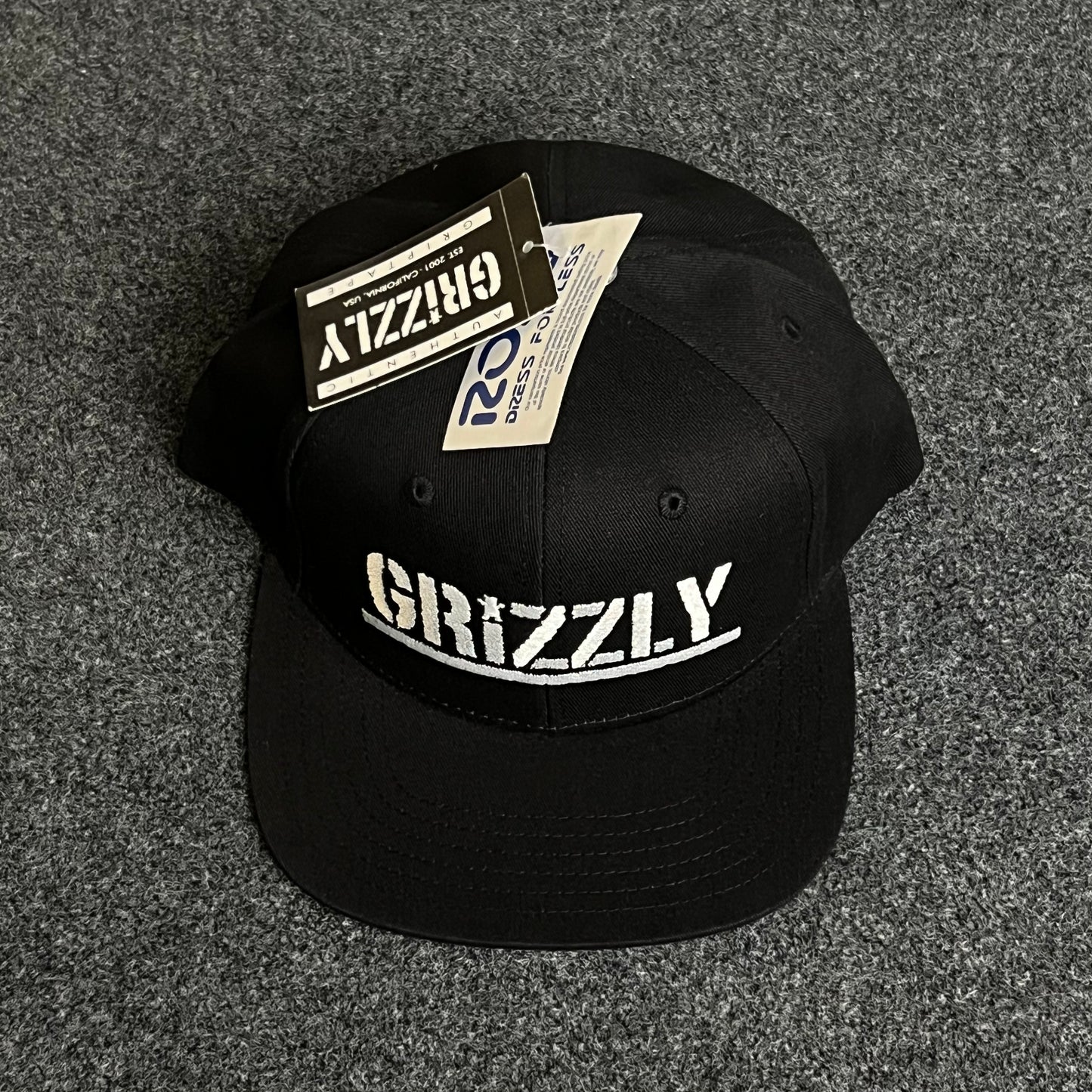"GRIZZLY" Signature skate style, bold graphic impact Flat Cap