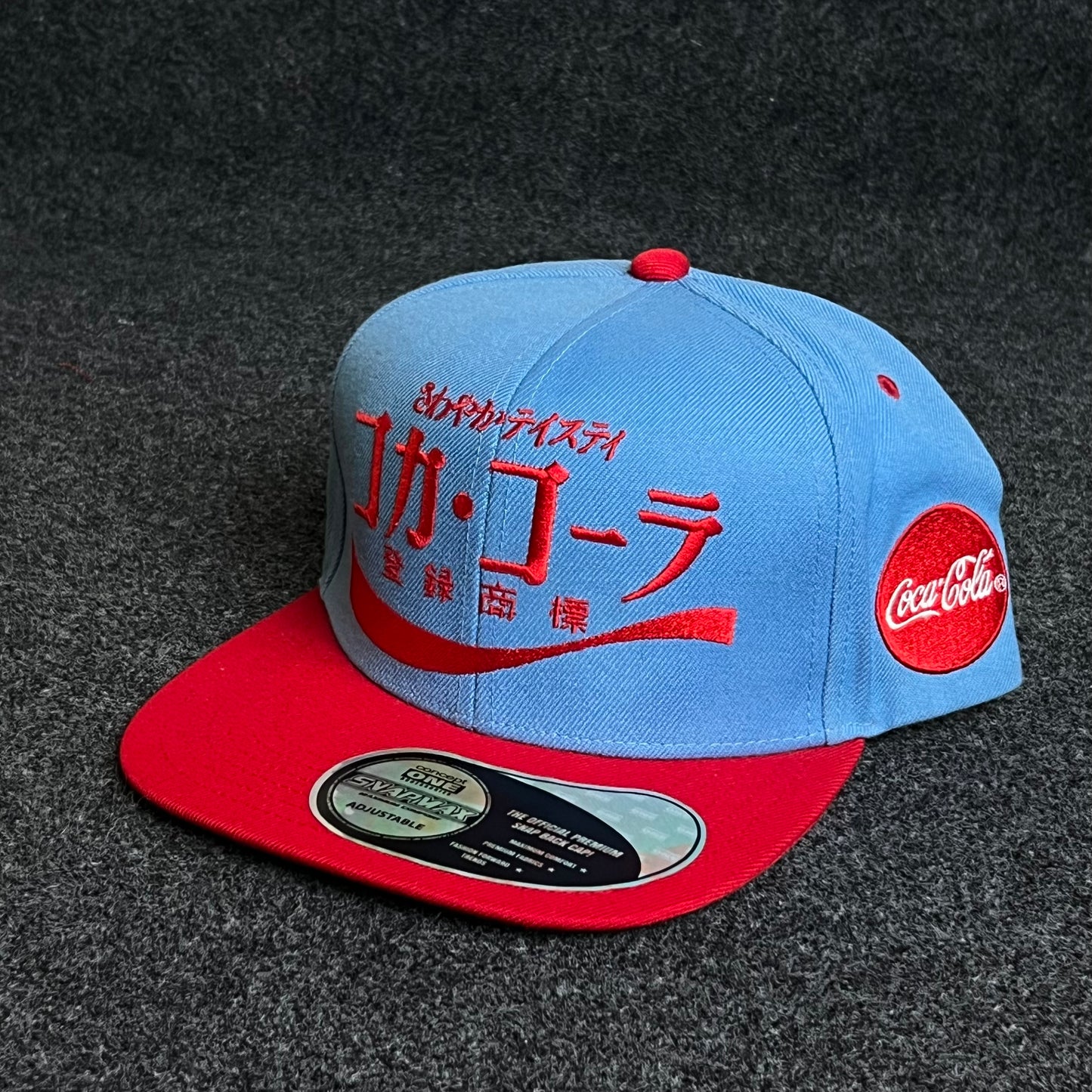 Coca-Cola International flair for the classic cola collector flat cap