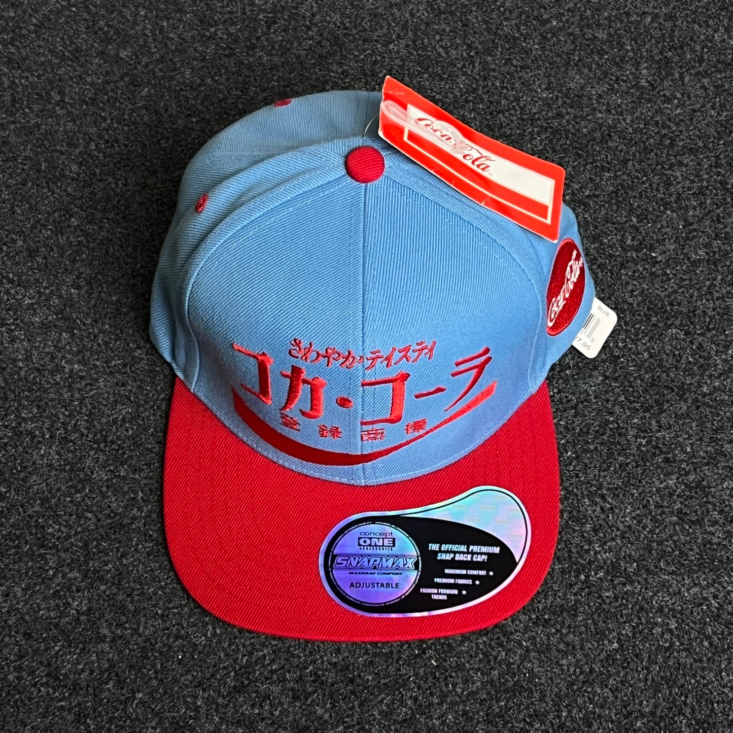 Coca-Cola International flair for the classic cola collector flat cap