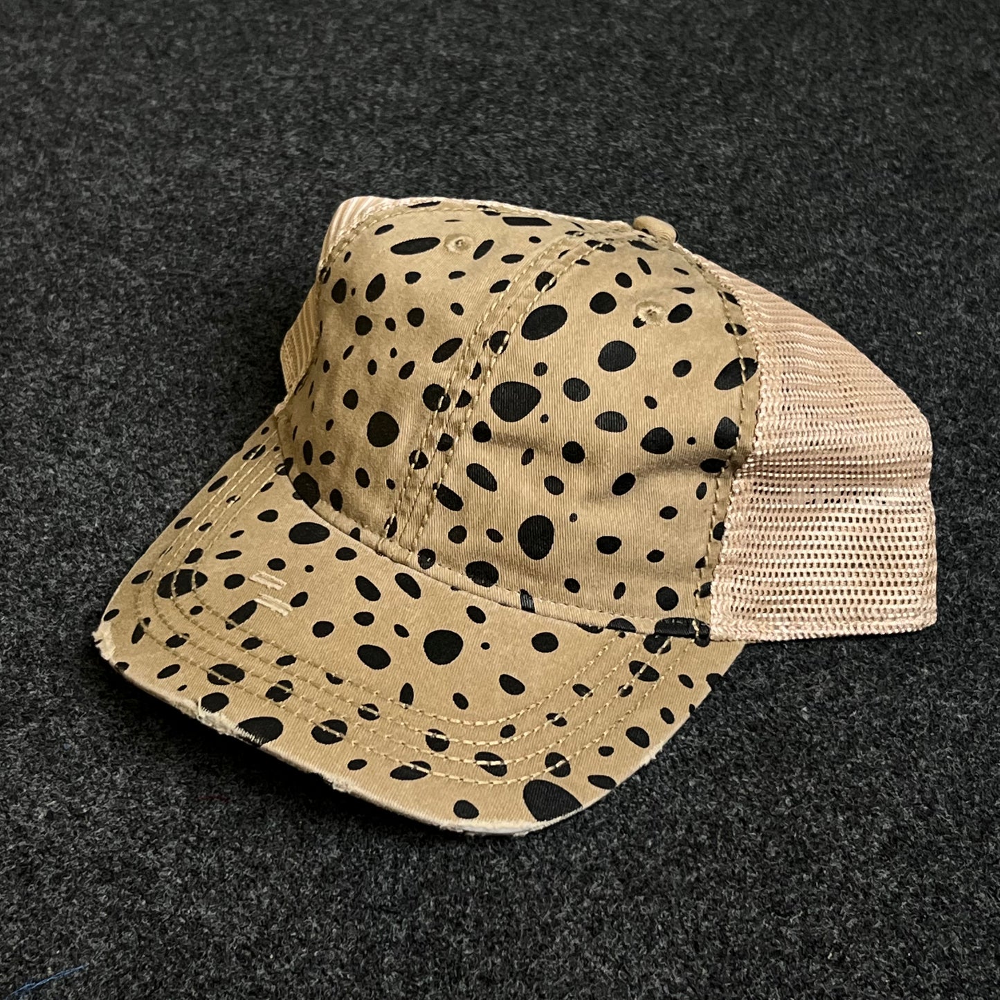 Distressed Trucker Hat With A Cheetah Print Design