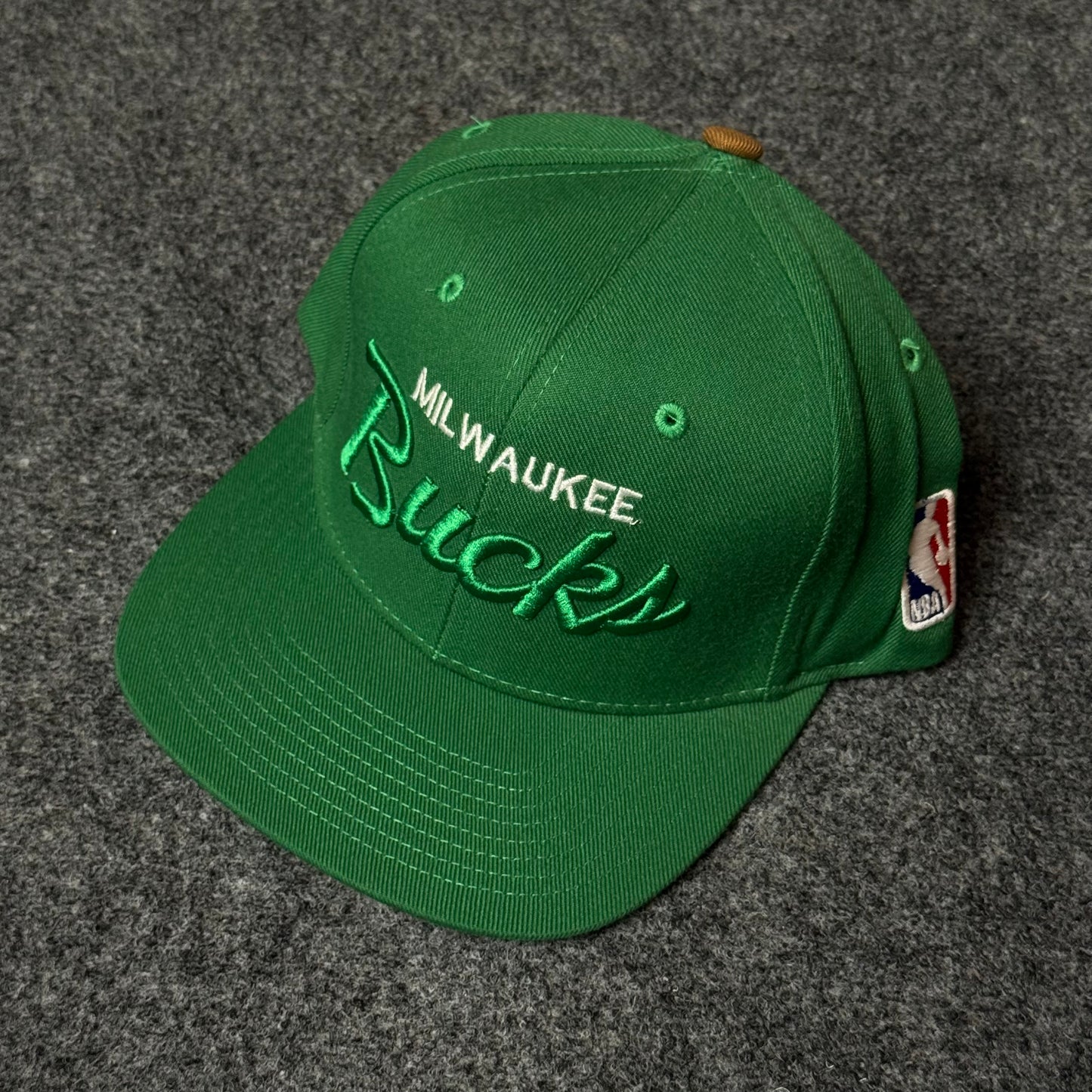 Mitchell & Ness Milwaukee Bucks Vintage Script Snapback Cap