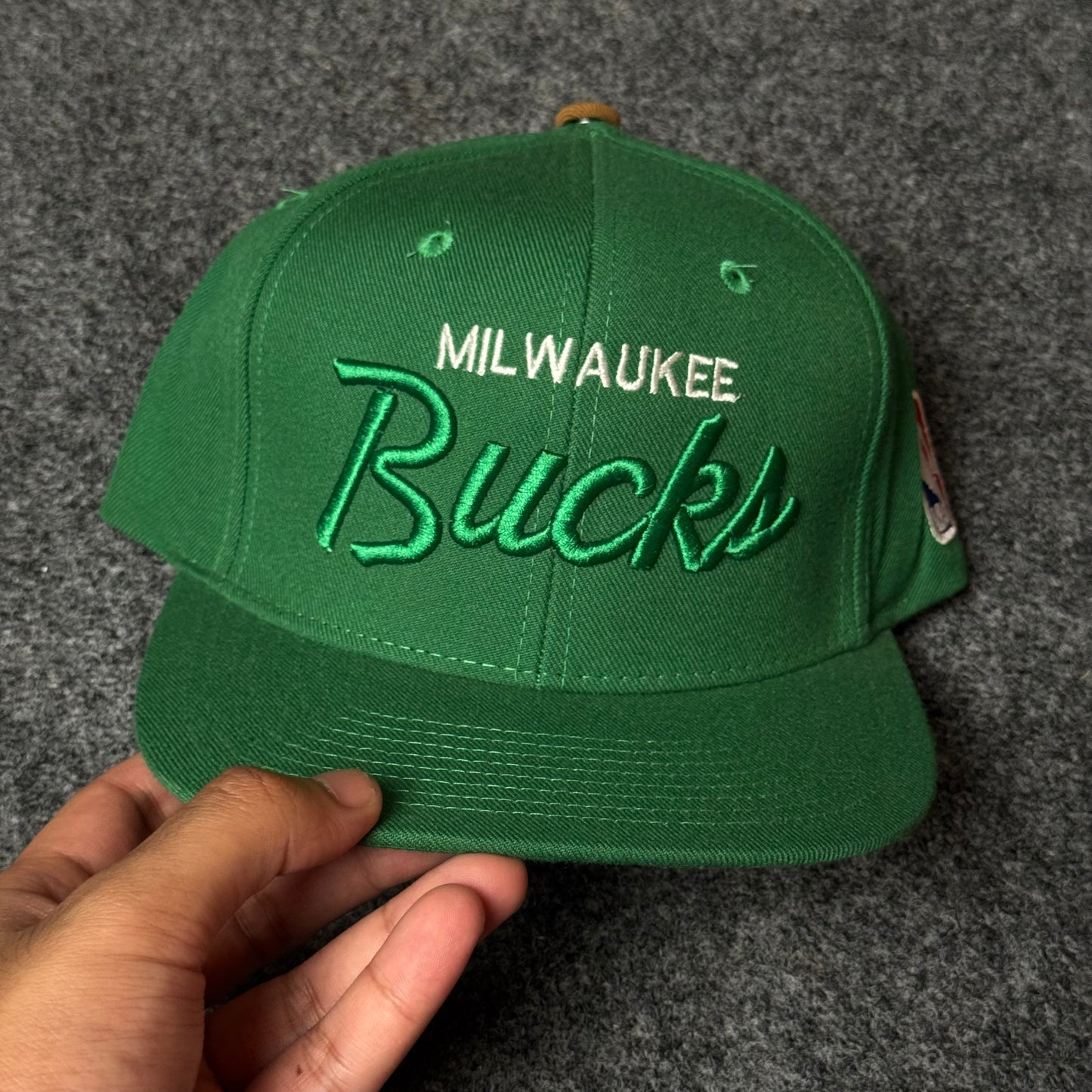 Mitchell & Ness Milwaukee Bucks Vintage Script Snapback Cap