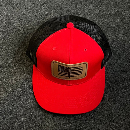 Patriotic Trucker Hat with A Leather Patch featuring A Distressed American Flag and A Knife