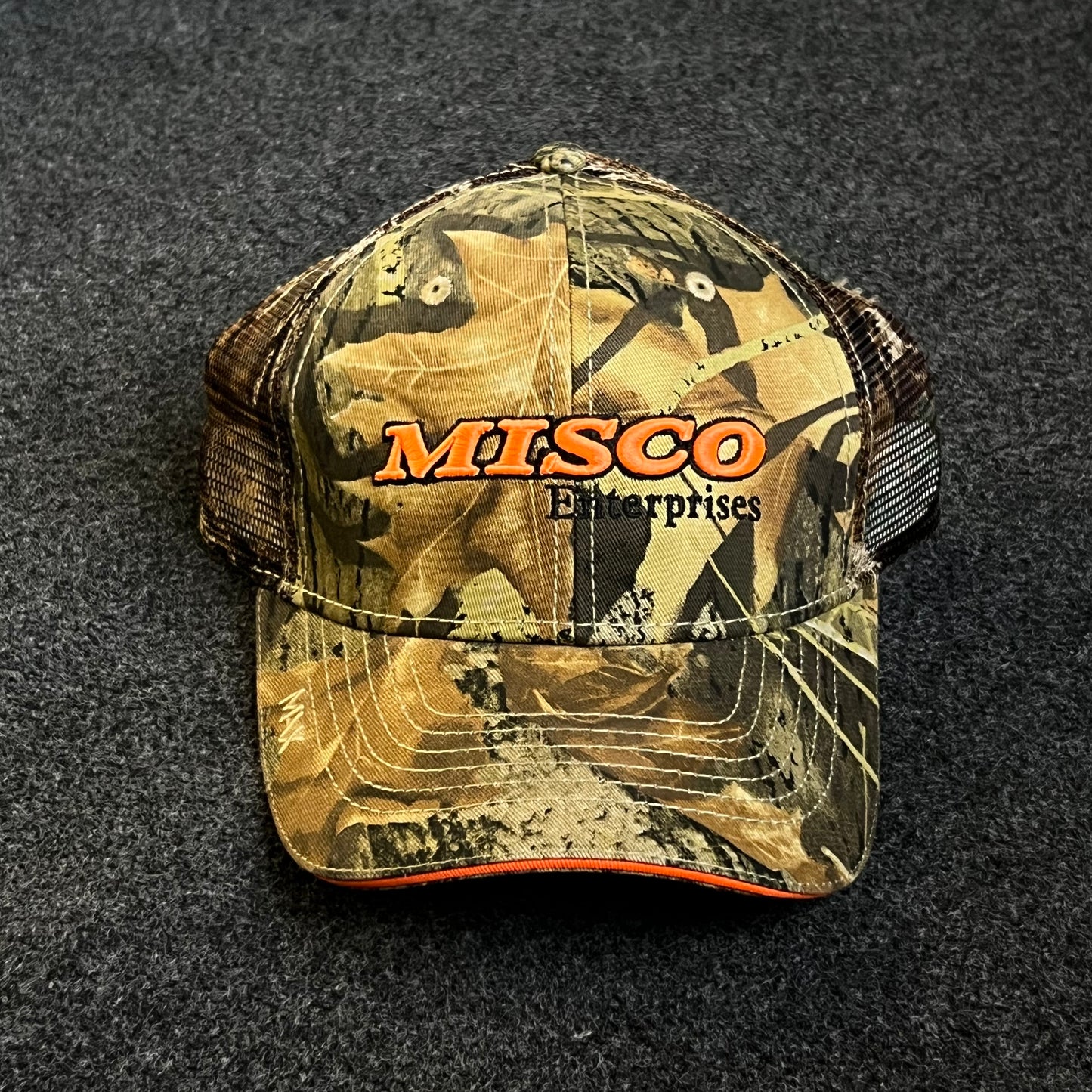 MISCO Enterprises camouflage trucker hat