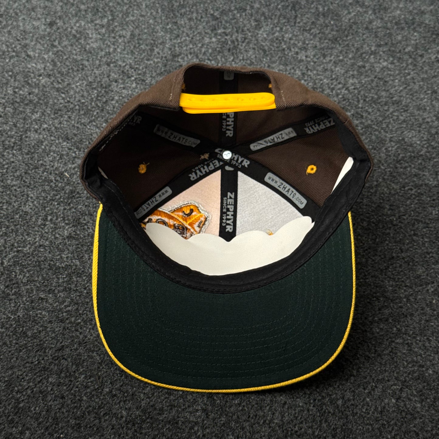 Wyoming Cowboys "Pistol Pete" Snapback Flat Bill Cap