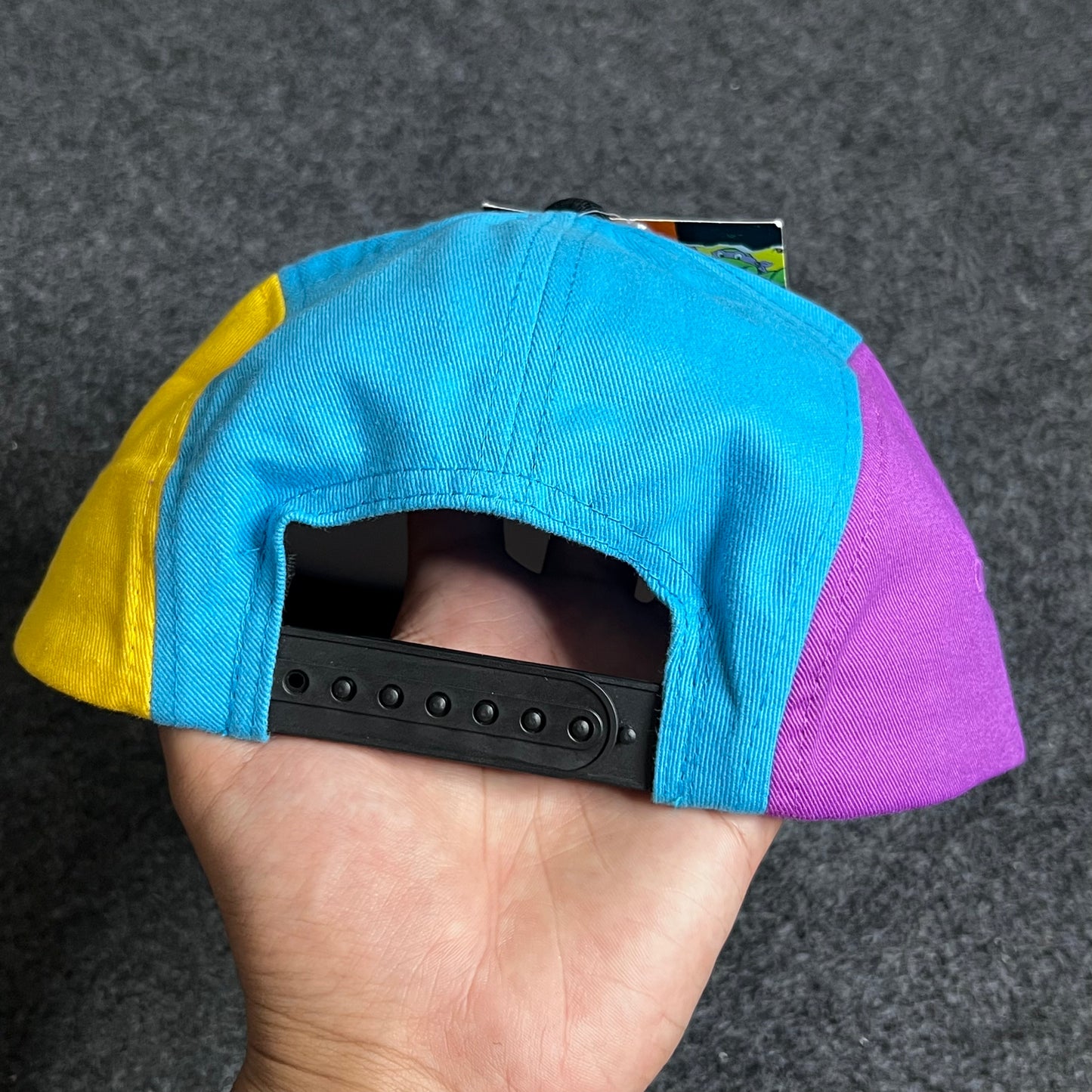 Teenage Mutant Ninja Turtles (TMNT) snapback cap.