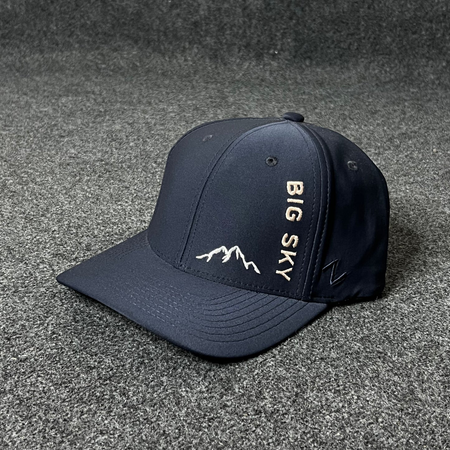 Big Sky Montana themed baseball cap featuring a mountain outline logo Fitted Cap ( XL size )