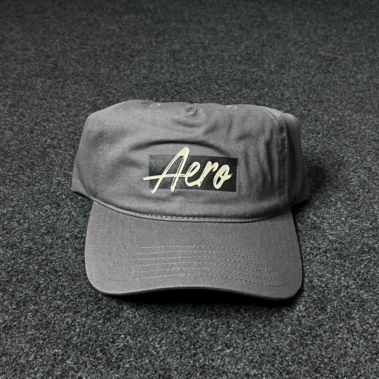 Aero Script Grey Cap