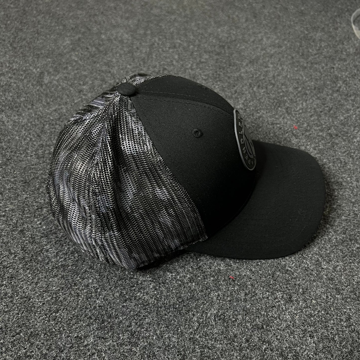 Project X Phoenix Trucker Hat – Black Mesh Cap.