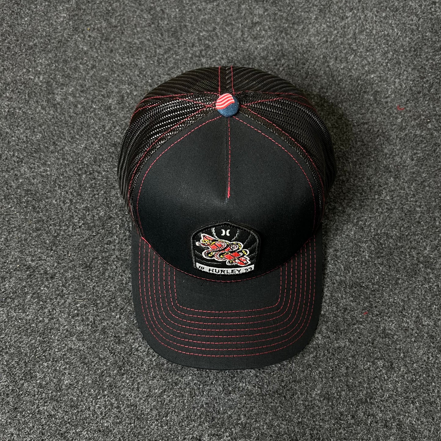 Snake Pit Trucker Hat – Black & Red Mesh Cap