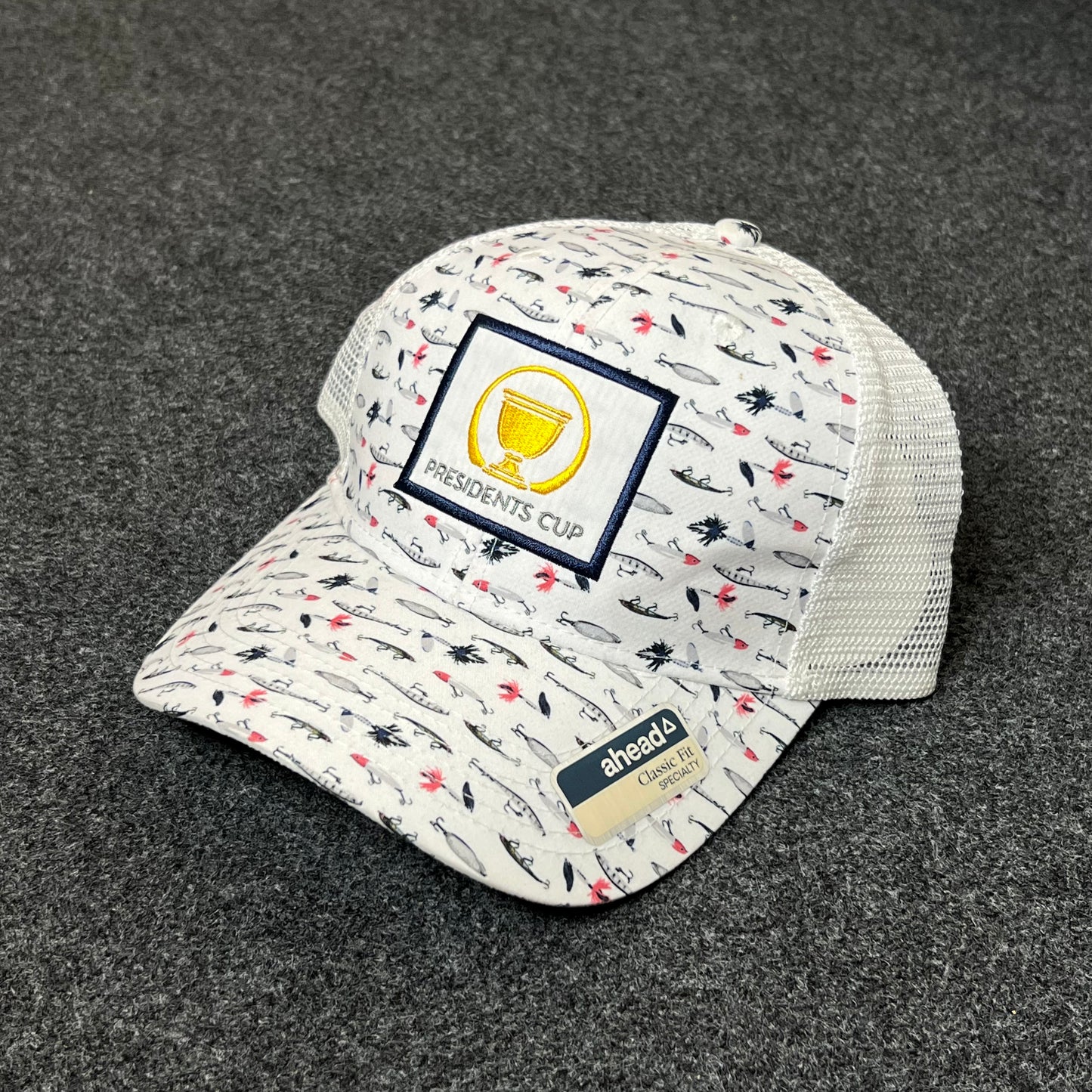 Presidents Cup Patterned Mesh Back Trucker Hat – White