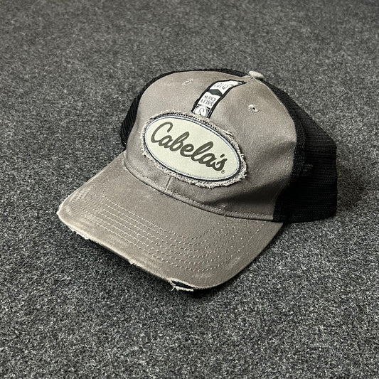 Cabela’s Distressed Mesh Back Trucker Hat – Gray & Black