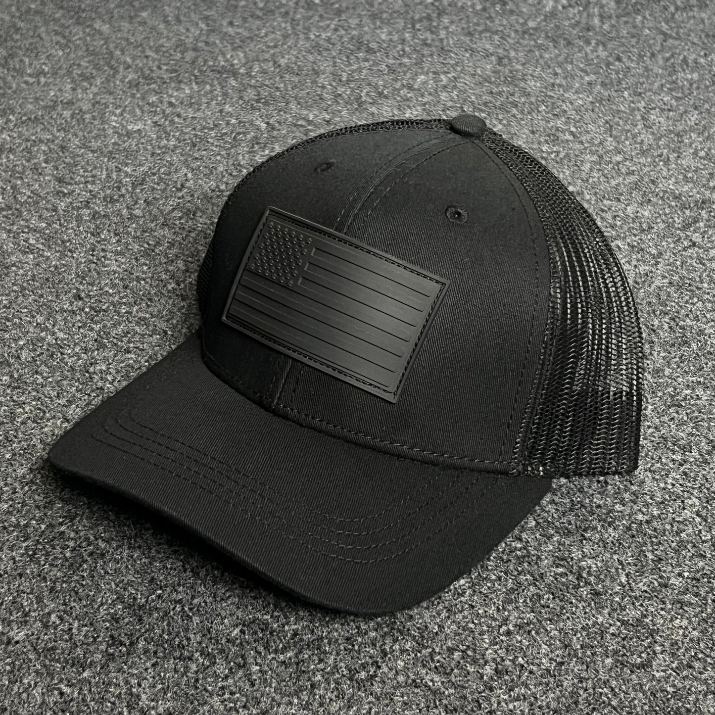 Blackout American Flag Trucker Cap – Full Black