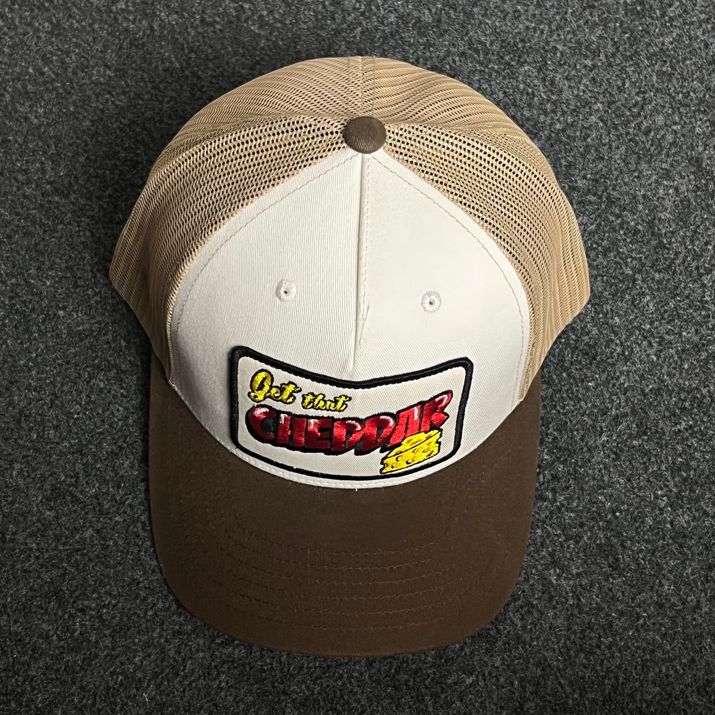 Brown & Beige Mesh Trucker Cap – “Get the Cheddar” Patch