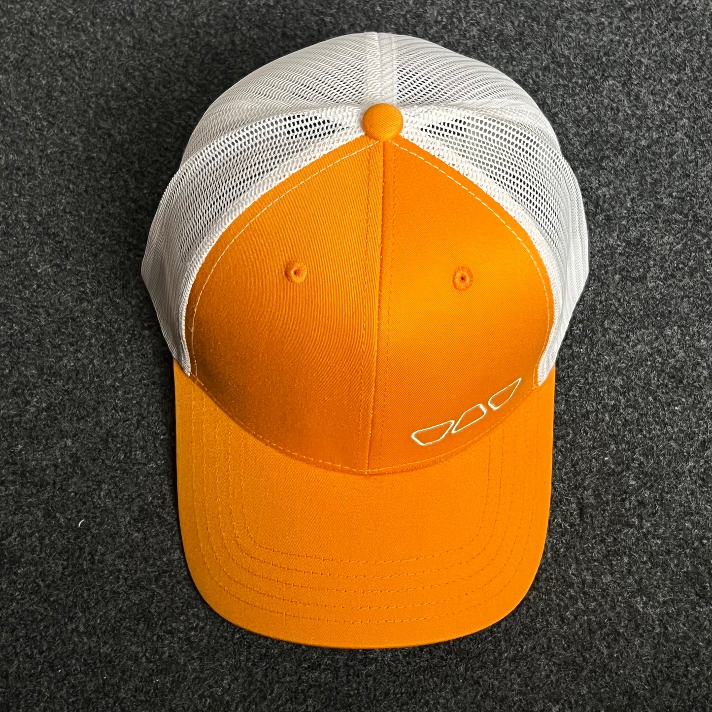 Orange & White Mesh Trucker Cap – Minimalist Shades Design