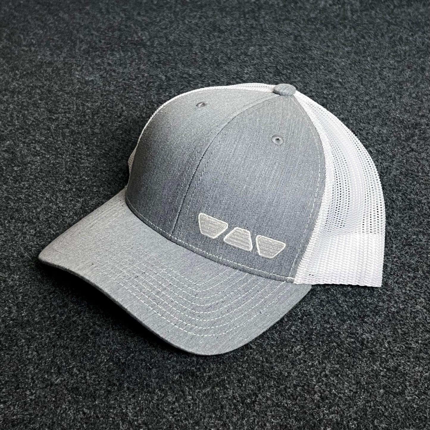 Gray & White Mesh Trucker Cap – Minimalist Shades Design