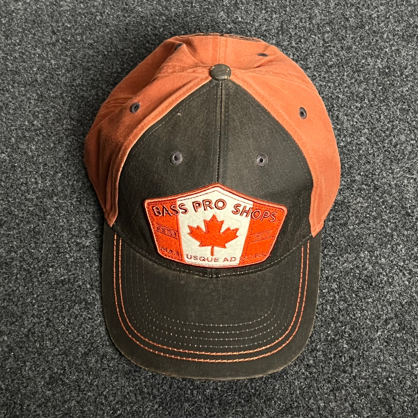 Bass Pro Shops Baseball Cap – Charcoal & Burnt Orange (Canada Patch)