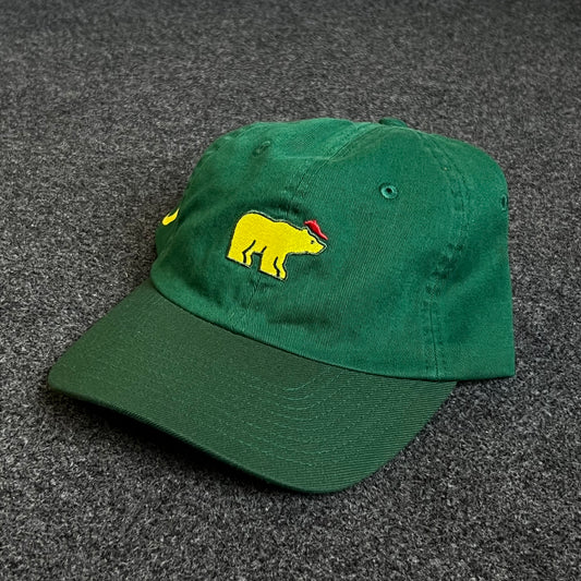 Unstructured Dad Cap – Forest Green with Yellow Bear (Red Accent)