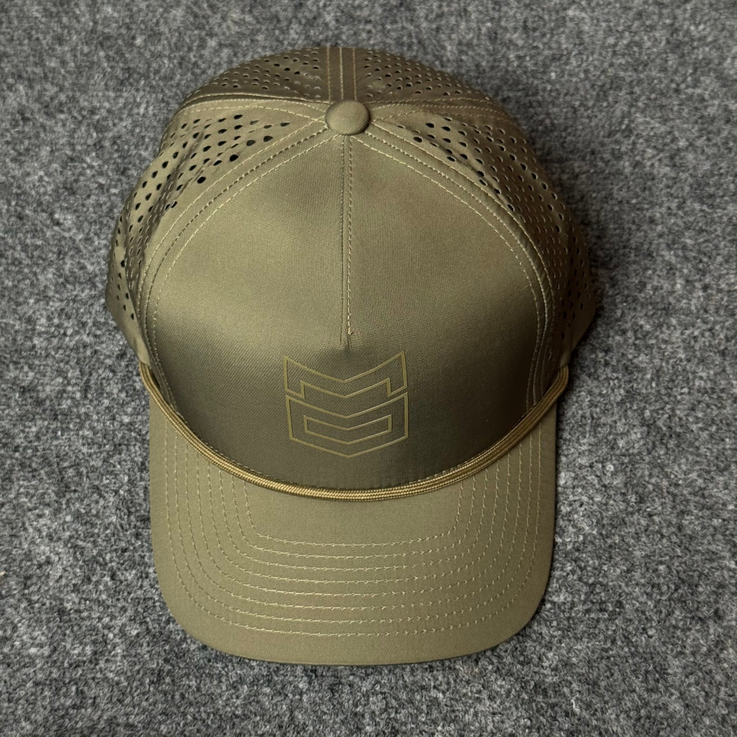 MTN OPS Rush Cap (in the Loden colorway)