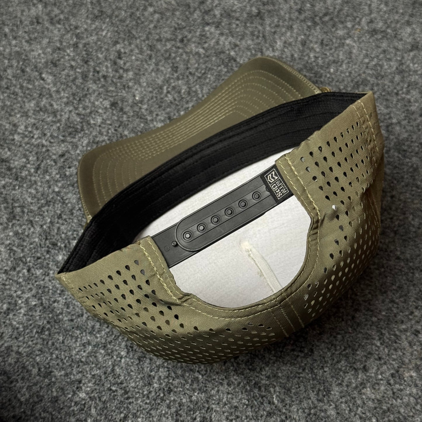 MTN OPS Rush Cap (in the Loden colorway)