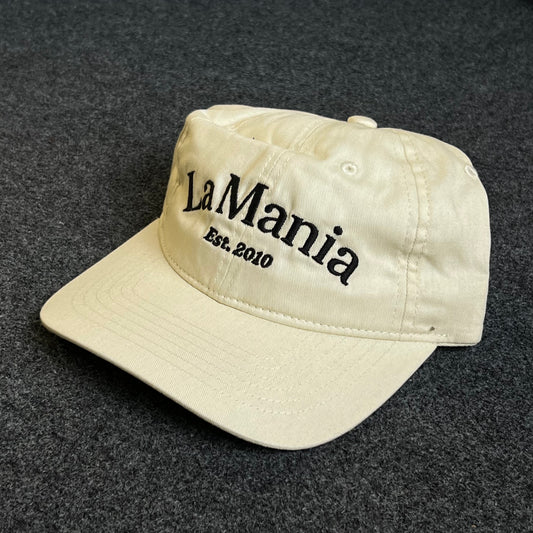 Unstructured Dad Cap – Cream “La Mania – Est. 2010”