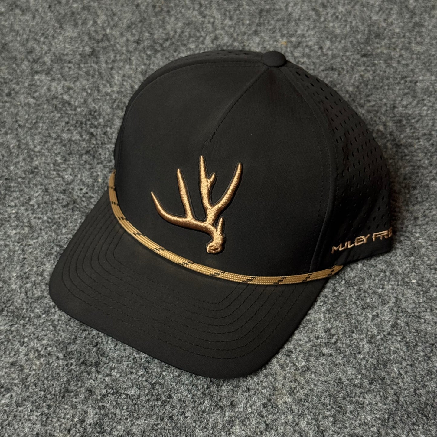 Muley Freak PRO Elk Shed Rope Trucker Cap (in the Black/Gold colorway)