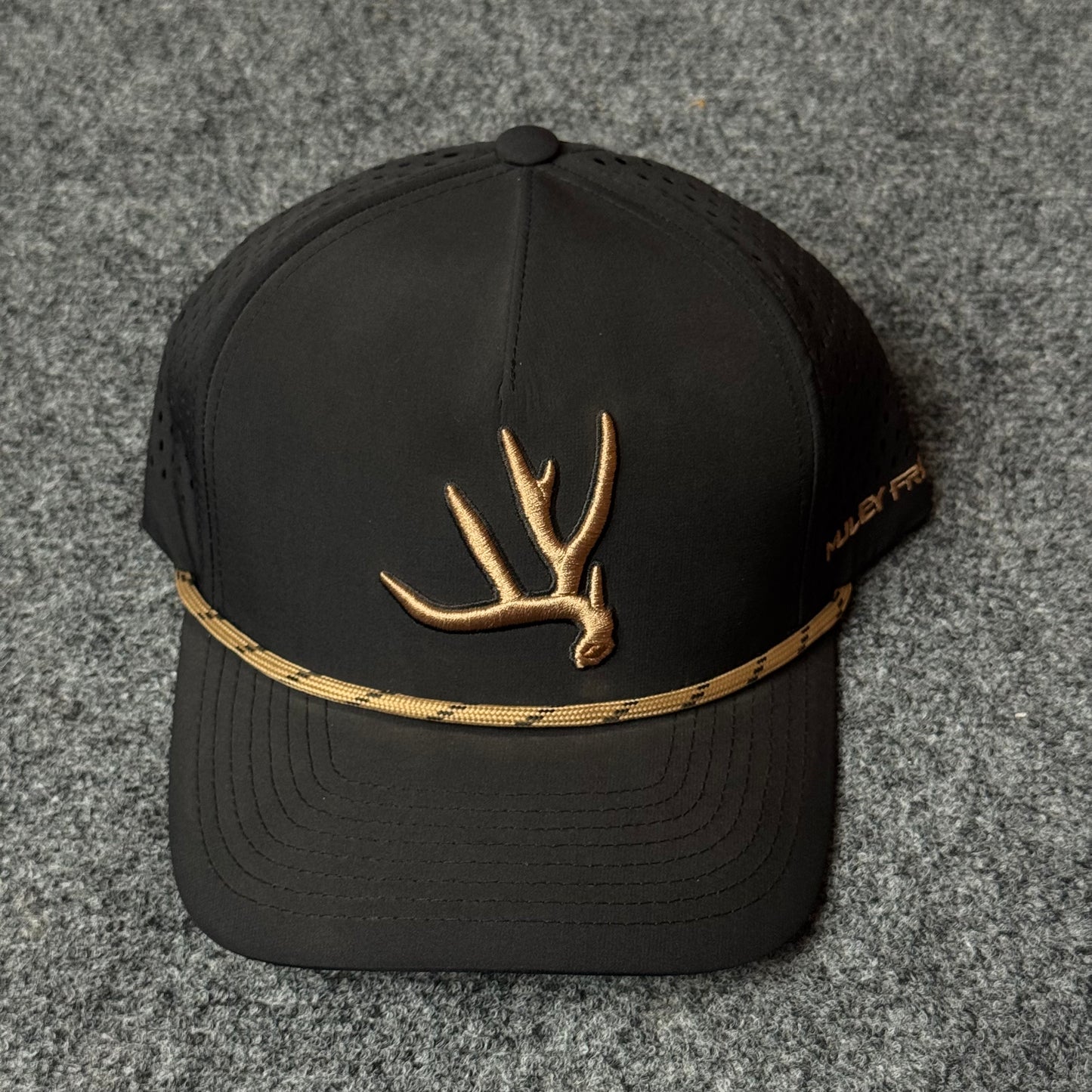 Muley Freak PRO Elk Shed Rope Trucker Cap (in the Black/Gold colorway)