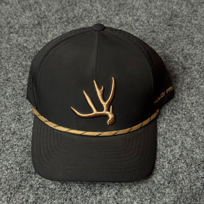 Muley Freak PRO Elk Shed Rope Trucker Cap (in the Black/Gold colorway)