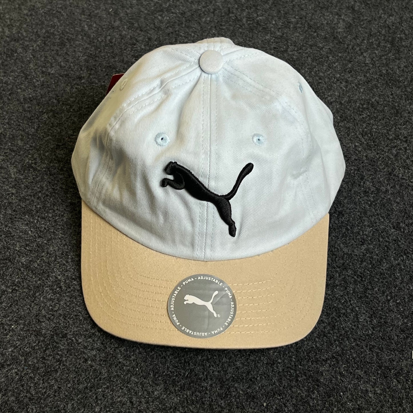 PUMA Unstructured Dad Cap – White & Beige (Black Jumping Cat Logo)