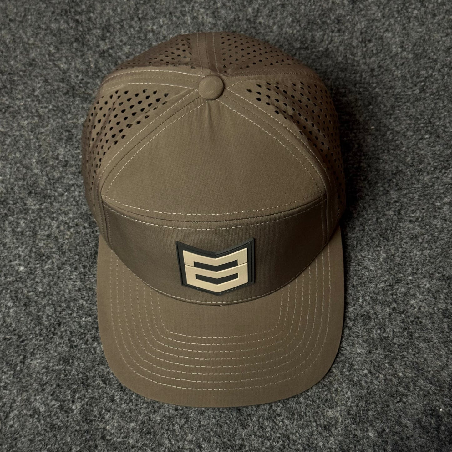 MTN OPS Rush Cap (in the Loden colorway)