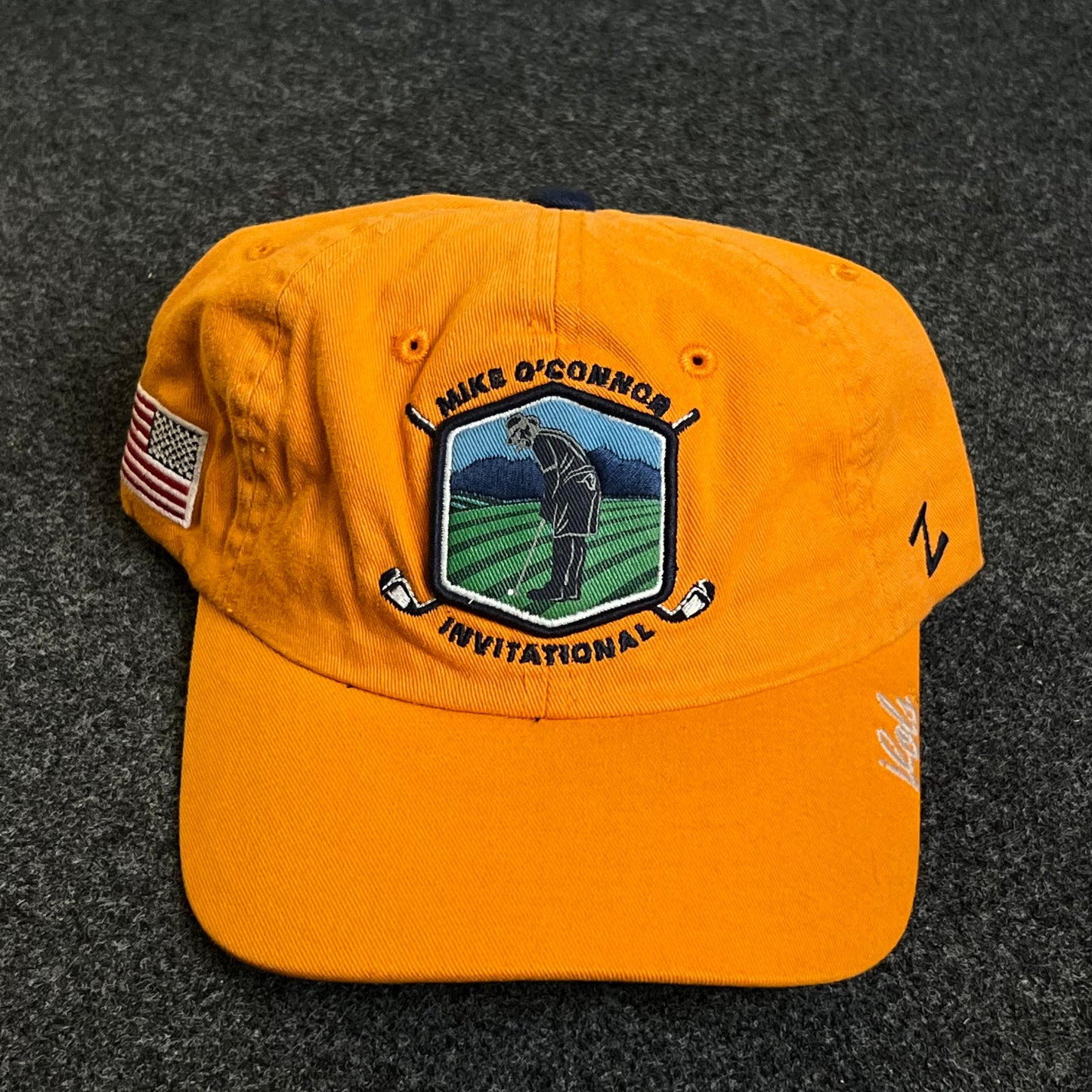 Unstructured Dad Cap – Gold “Mike O’Donnell Invitational” (Signature Brim)